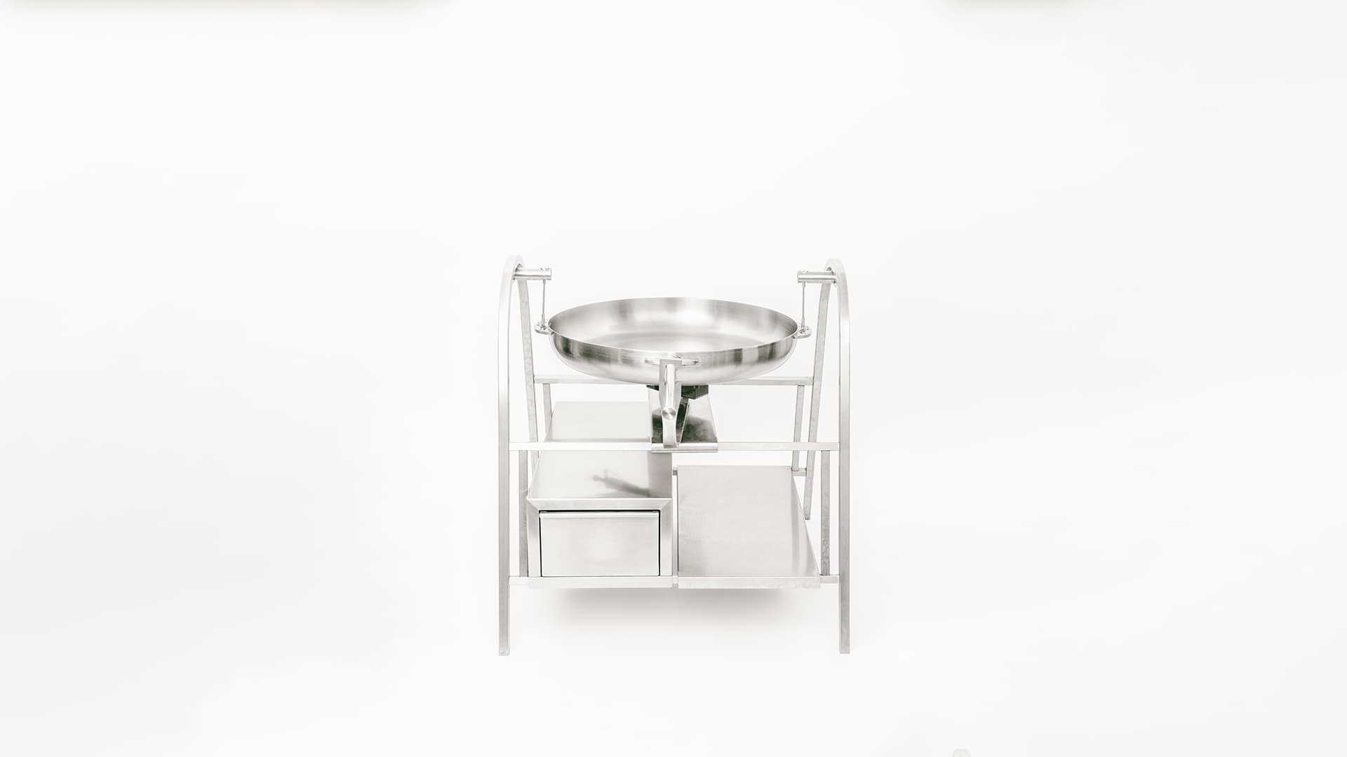 a blue speaker with a wire attached to it